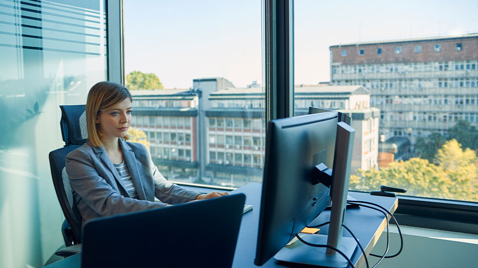 Woman using a computer in an office